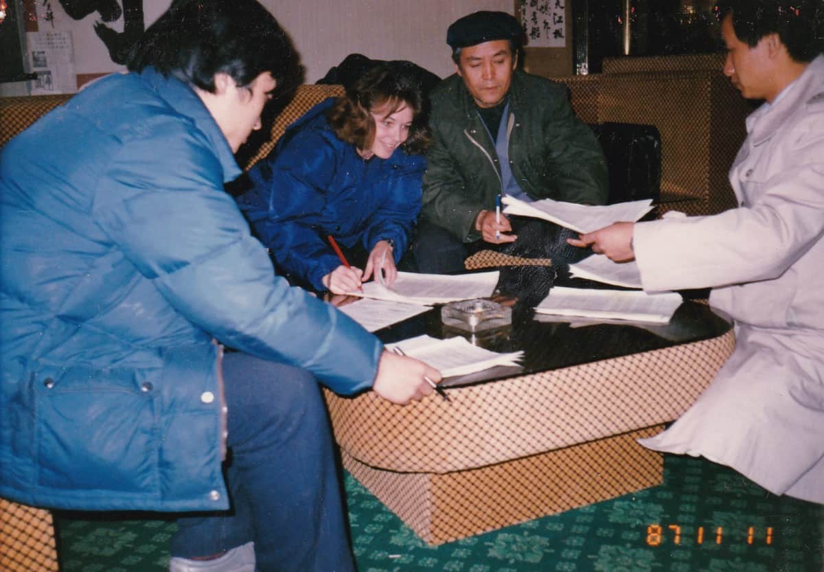 Sue Capie meets with representatives from Harbin Pharmaceutical in Harbin, China, in 1987. | The Wire