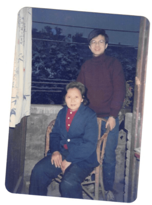 A young Li Qiang with his mother in China.