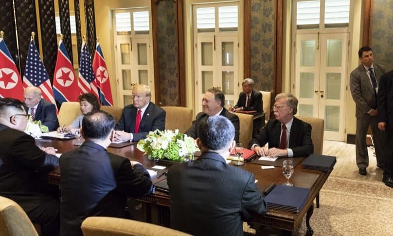 Bolton, President Trump and Kim Jong-un at DPRK–USA Singapore Summit on June 12, 2018.
