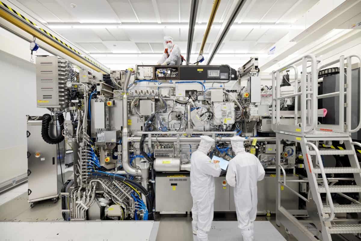 Extreme ultraviolet lithography system in assembly in an ASML cleanroom.