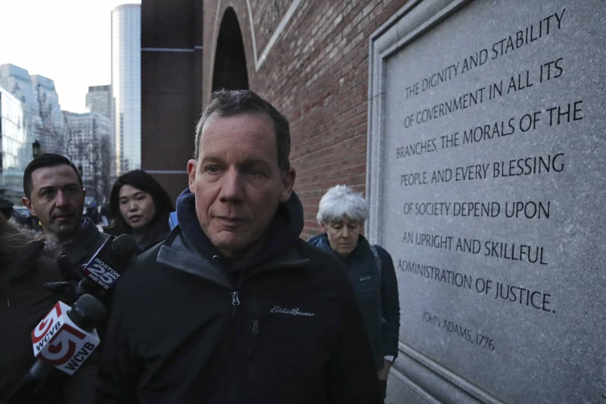 Lieber leaves the Moakley Federal Courthouse with his wife Jennifer, right, in Boston, Thursday, Jan. 30, 2020. 