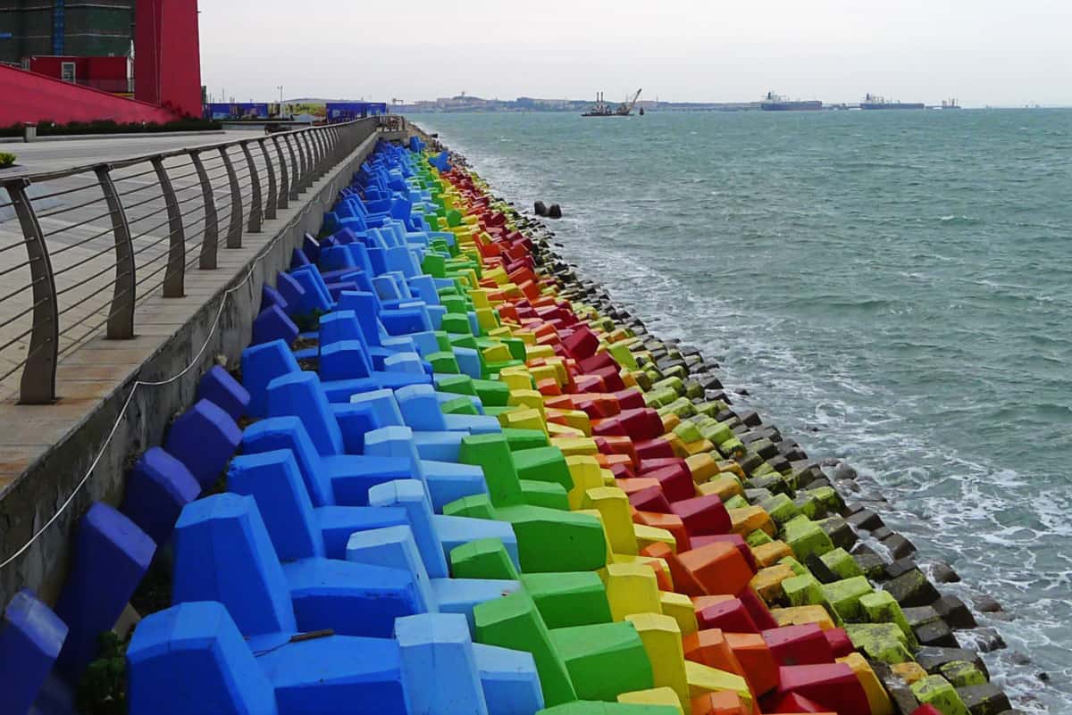 Painted breakwater blocks color up Wanda Victoria Bay in east China
